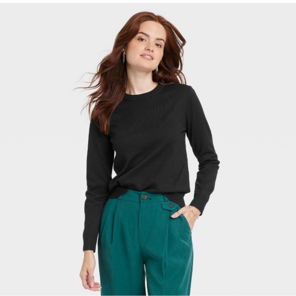 A new day black crewneck sweater, size large, never worn